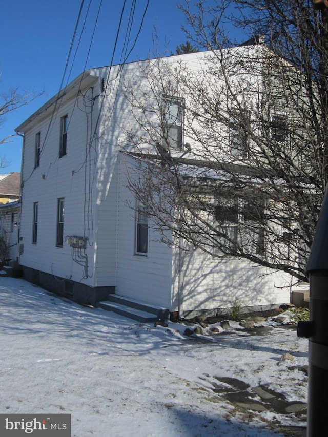 view of snow covered property