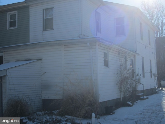 view of snow covered property