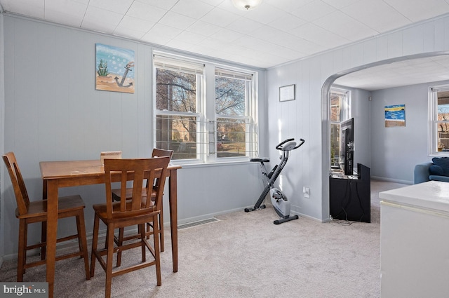 workout area with light colored carpet