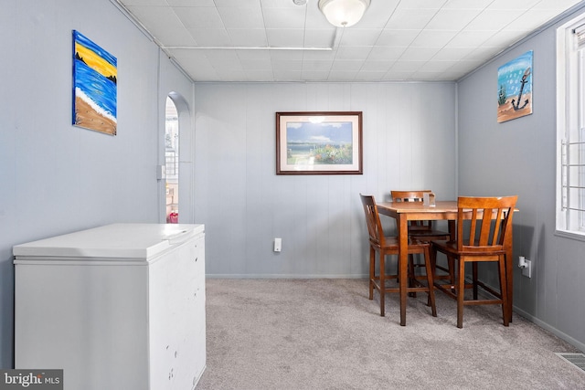 view of carpeted dining space