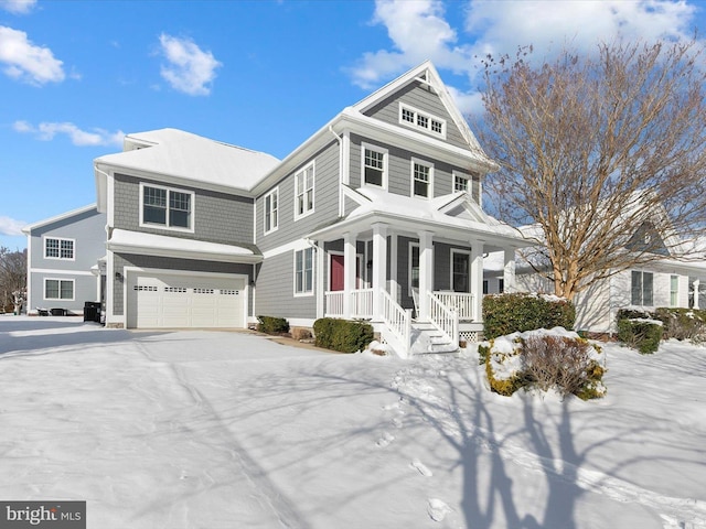 view of front of home featuring a porch and a garage