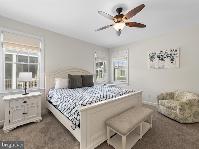 bedroom with ceiling fan and carpet