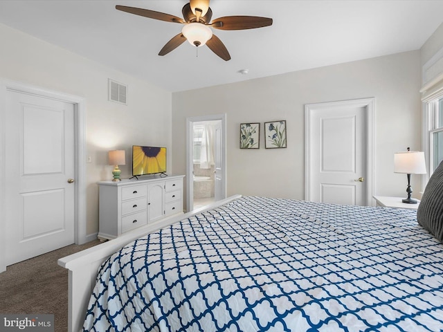 bedroom featuring connected bathroom, ceiling fan, and carpet