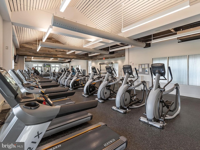 workout area featuring lofted ceiling