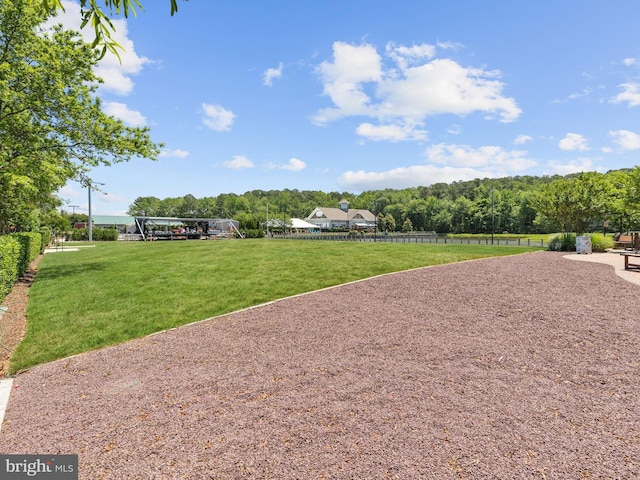 view of community featuring a lawn