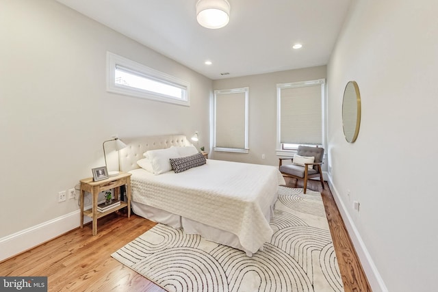 bedroom with light hardwood / wood-style flooring