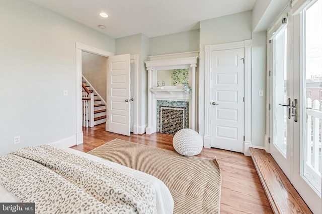 bedroom with light hardwood / wood-style floors