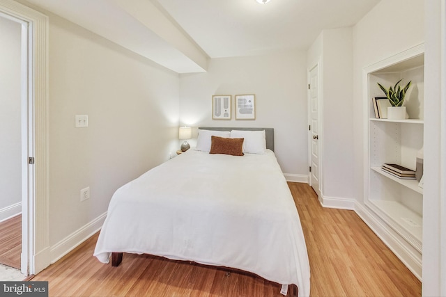 bedroom featuring hardwood / wood-style floors