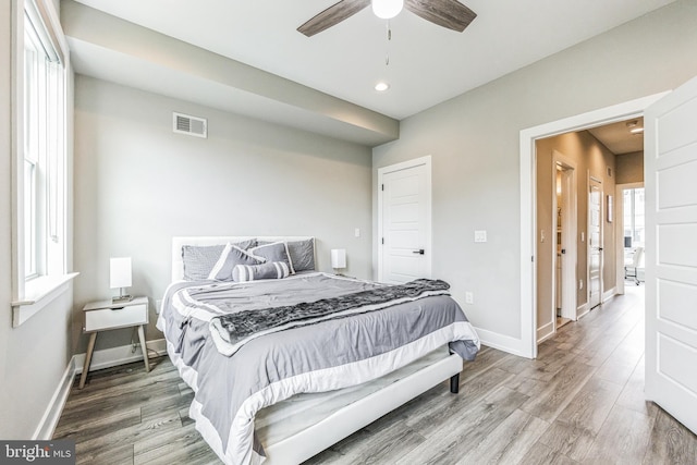 bedroom featuring ceiling fan and hardwood / wood-style floors