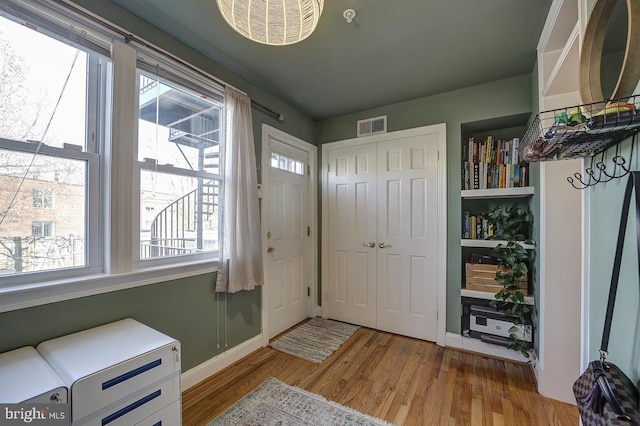 foyer featuring light wood-type flooring