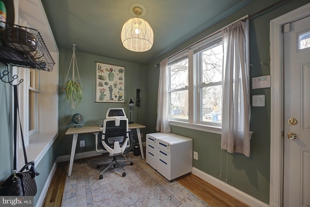 home office featuring light hardwood / wood-style flooring and plenty of natural light