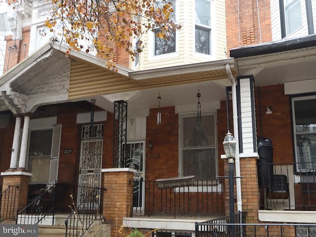 exterior space featuring covered porch