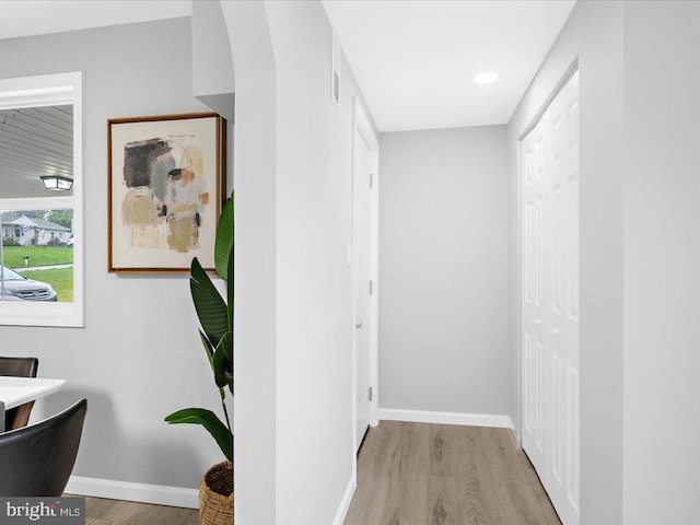 hallway featuring light wood-type flooring