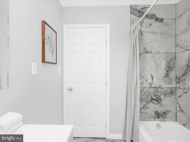 bathroom with vanity and shower / bath combo with shower curtain