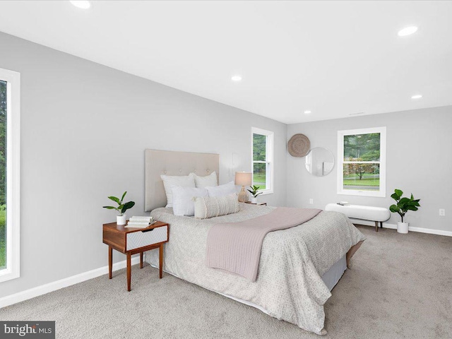 bedroom with light carpet