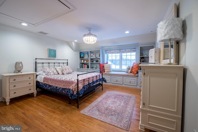 bedroom with light wood-type flooring