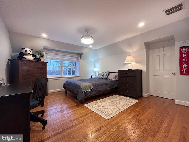 bedroom featuring light hardwood / wood-style floors