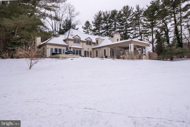 view of new england style home