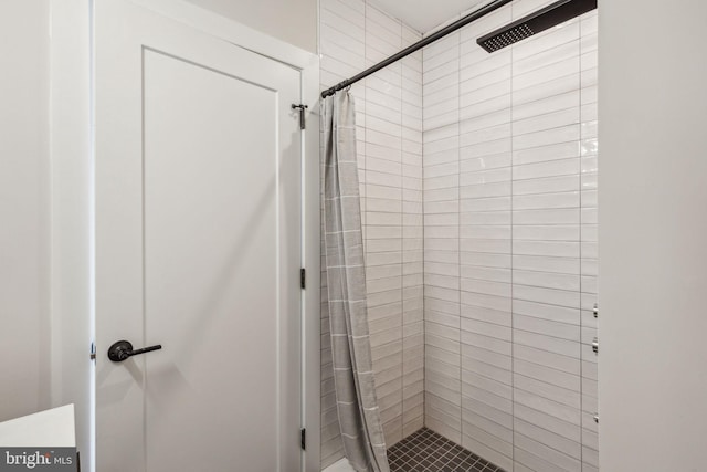 bathroom with a shower with curtain