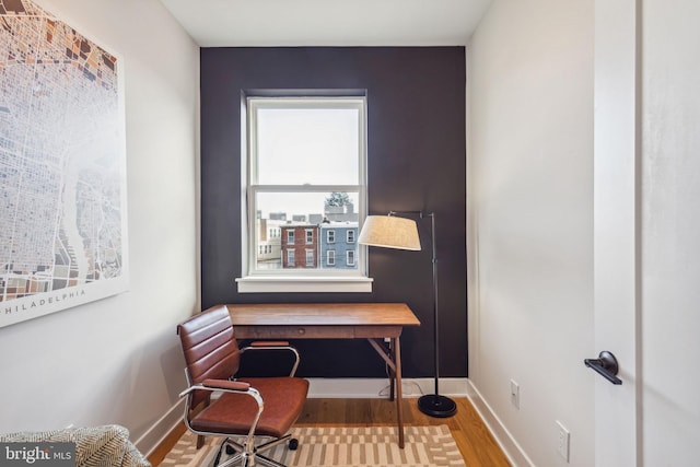 living area with hardwood / wood-style floors