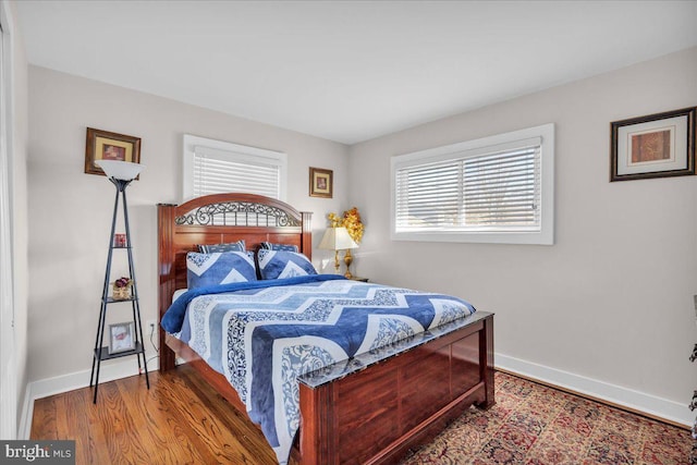 bedroom featuring hardwood / wood-style flooring