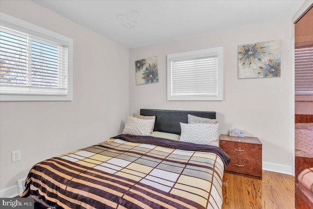 bedroom featuring light hardwood / wood-style floors