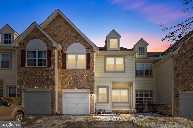 view of front of property featuring a garage