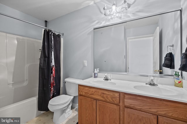 full bathroom featuring shower / tub combo with curtain, vanity, and toilet