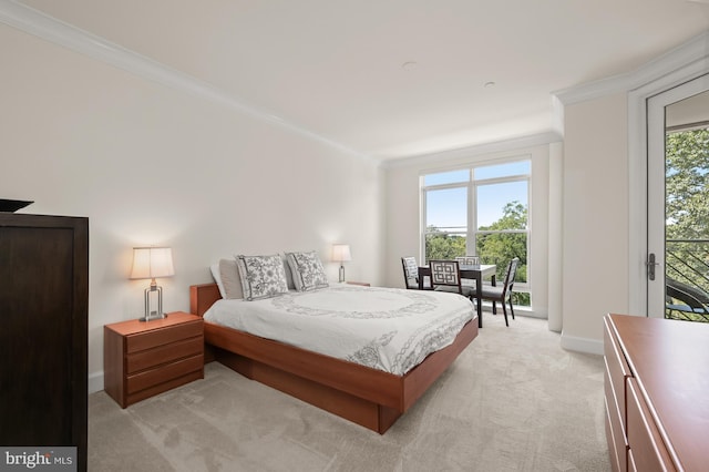 carpeted bedroom featuring crown molding