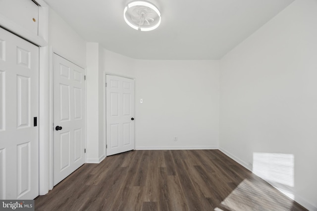 interior space with dark wood-type flooring