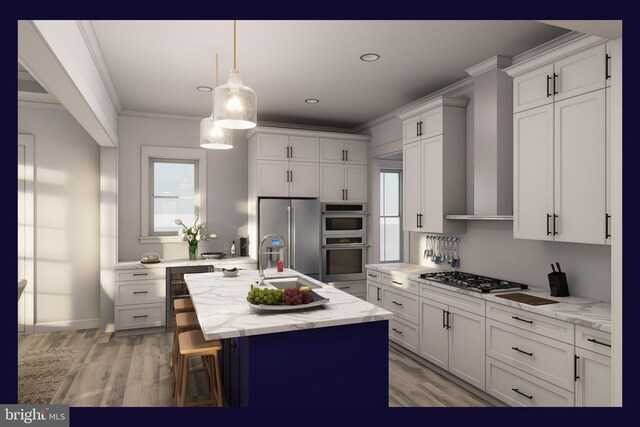 kitchen featuring a center island with sink, stainless steel appliances, pendant lighting, light stone counters, and light hardwood / wood-style flooring