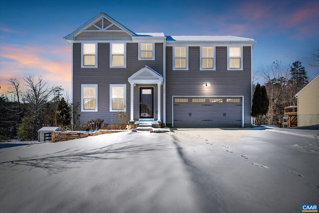 view of front of home with a garage