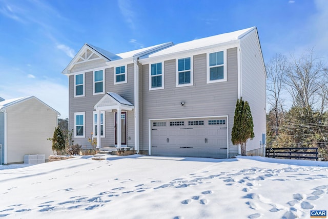 view of front of home with a garage