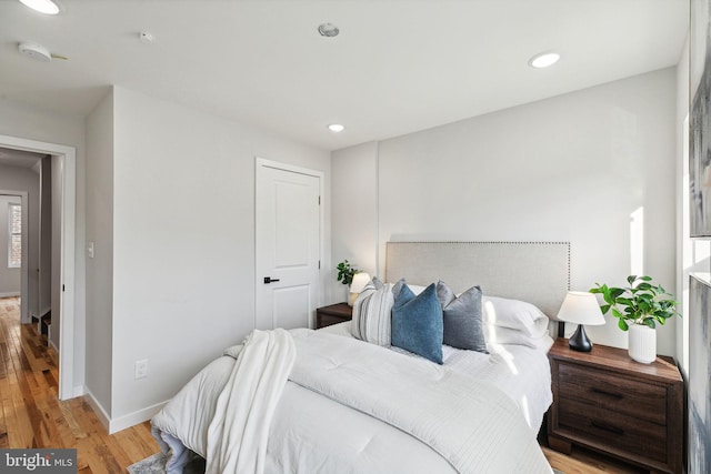 bedroom featuring light hardwood / wood-style floors