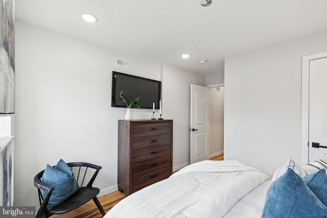 bedroom featuring light hardwood / wood-style flooring