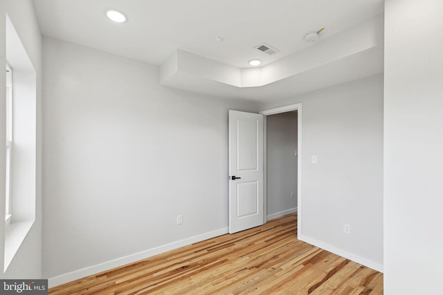 empty room with light wood-type flooring