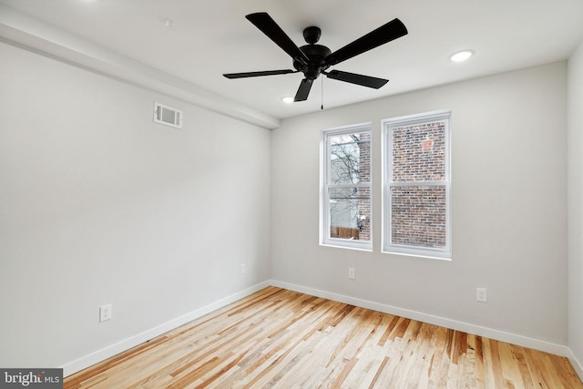 unfurnished room with light hardwood / wood-style floors and ceiling fan