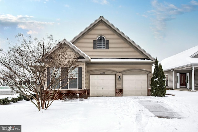 view of front of property with a garage