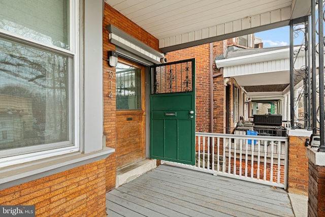 wooden terrace with covered porch