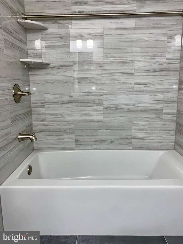 bathroom with shower / bath combination