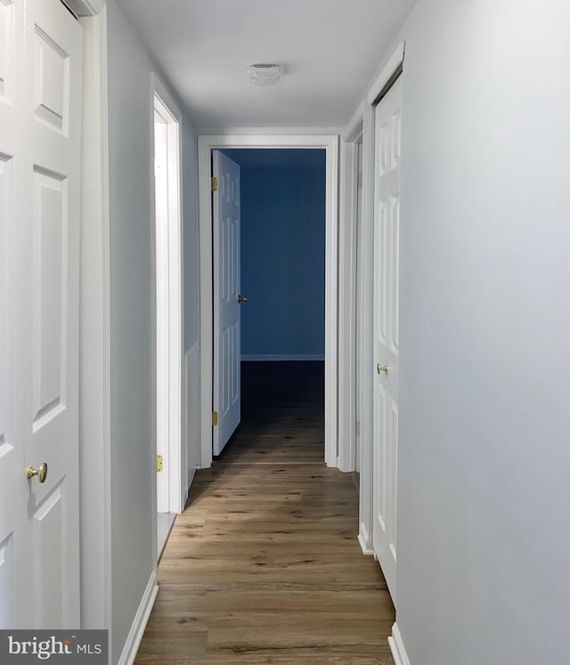 hall with light wood-type flooring