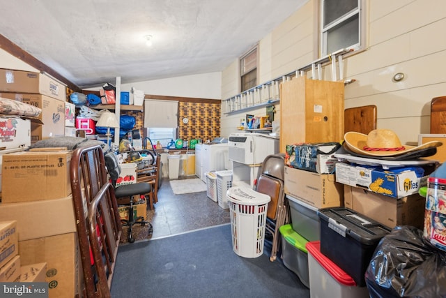 storage featuring washer and dryer