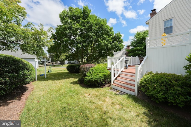 view of yard featuring a deck