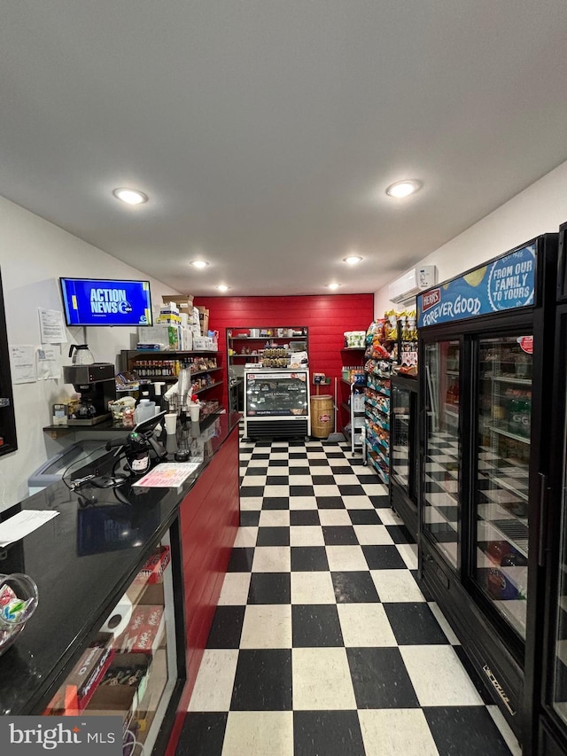 interior space featuring wine cooler and bar area