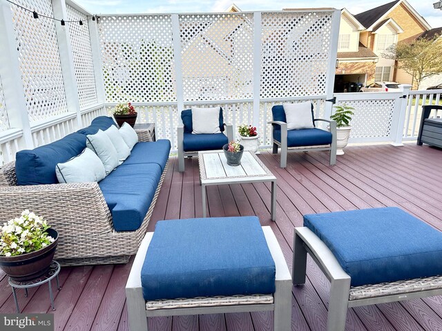 deck with an outdoor living space