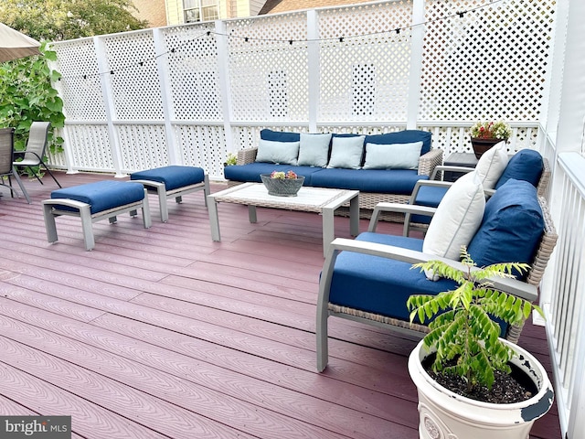 deck featuring an outdoor living space