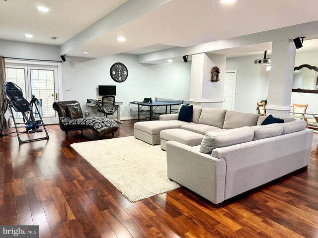 living room with dark wood-type flooring