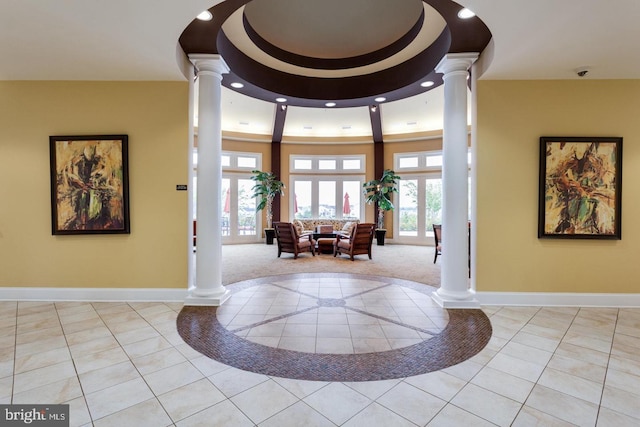 entrance foyer featuring french doors and light tile patterned flooring