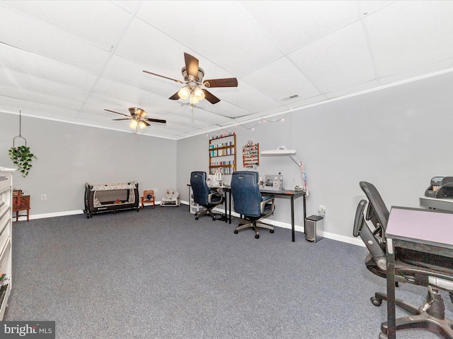 office with ceiling fan, a paneled ceiling, and carpet flooring