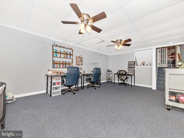 office with carpet floors, a paneled ceiling, and ceiling fan